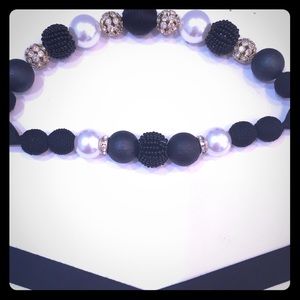 Ann Taylor F,  black, white and gold necklace.